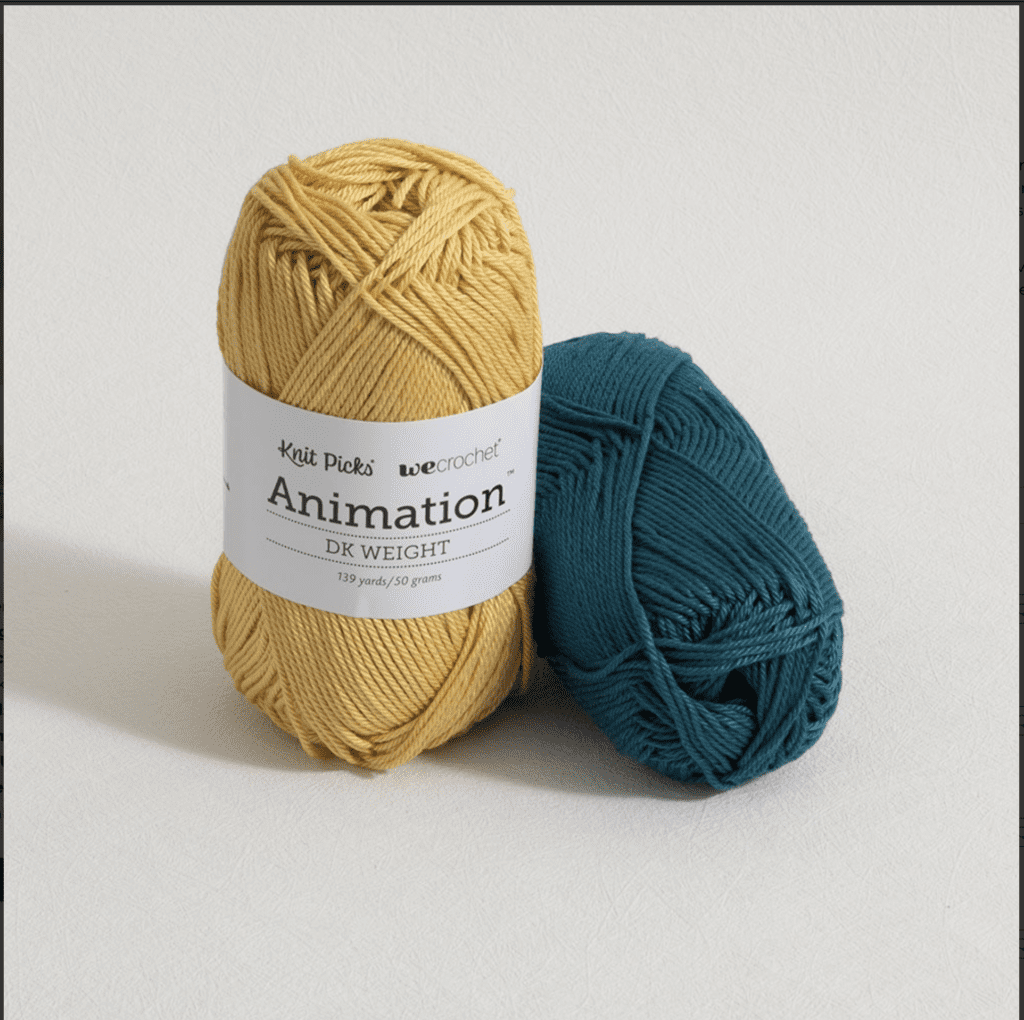         Two skeins of Knit Picks yarn from the WeCrochet Animation series are on a white surface. One is a golden yellow color, and the other is a teal blue. Both are labeled as DK weight, 115 yards, and 50 grams—perfect for easy amigurumi projects. -Marly Bird